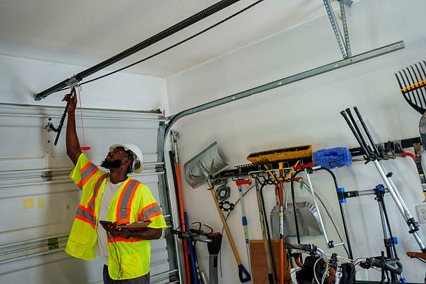Professional Garage Door Panel Replacement technician working in South Floral Park, NY